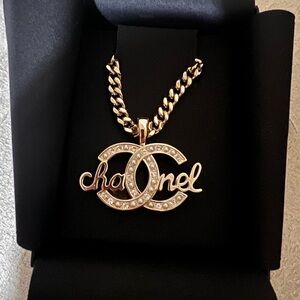 CHANEL Gold Logo Necklace with Crystal Accents